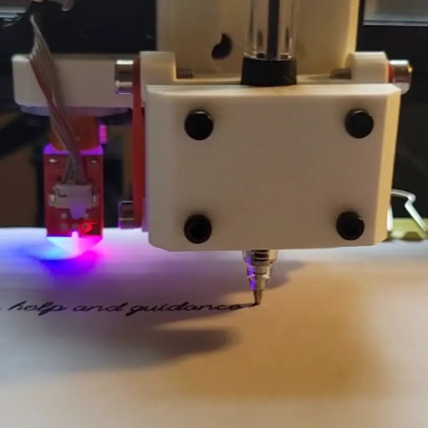 writing machine using a pen to write on paper